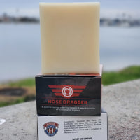 Hose Dragger natural men's soap for firefighters by Patriot and Company  soap and soap box in San Diego, California with ocean in background
