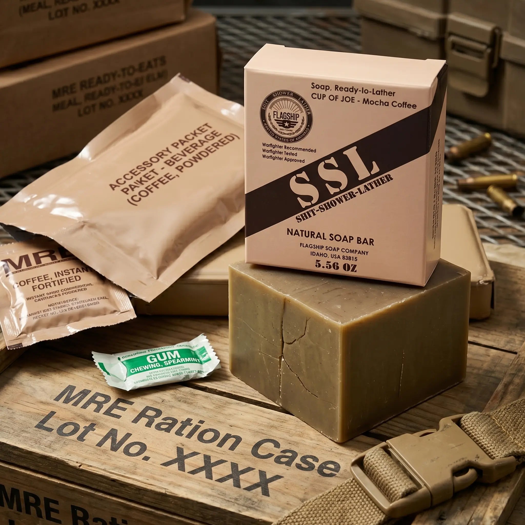 Flagship Soap Company "Cup of Joe" MRE-themed mocha coffee exfoliating soap bar (5.56 oz) displayed on a military ration case with an accessory packet and spearmint gum. Best tactical veteran and military gift featuring heavy-duty lather and natural ingredients.