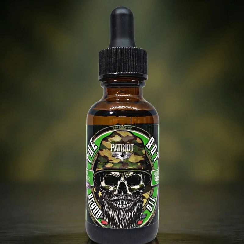 Flagship Soap Company "The Nut" Beard Balm in a 2oz plastic container with a screw-on lid. 100% natural oils soften the beard, prevent itching, and nourish for healthy skin and hair. Scent Profile: Classic outdoorsy Cedarwood and Pine. Lifestyle: Handcrafted in Idaho for the traditional woodsman.