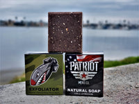 Exfoliator exfoliating natural men's soap by Patriot and Company with ocean in background in San Diego.