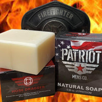 Hose Dragger natural men's soap for firefighters by Patriot and Company with soap and soap boxes with flame background and firefighter shield.